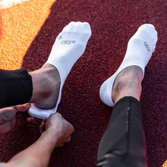 person wearing white nekkid comfort socks | no show, no slip | OS1st