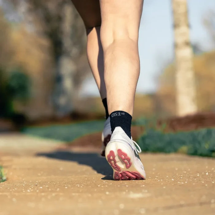 runner wearing black thin air performance sock in 3/4 crew height | OS1st