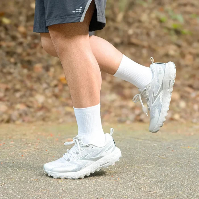 runner wearing white crew height wicked comfort performance socks | OS1st